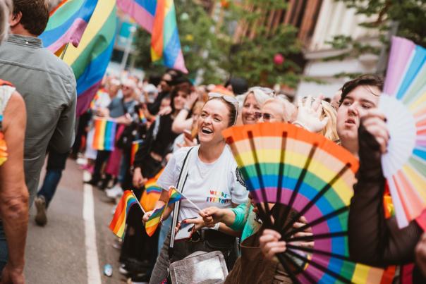 People lining the streets of Belfast for the annual Belfast Pride parade.