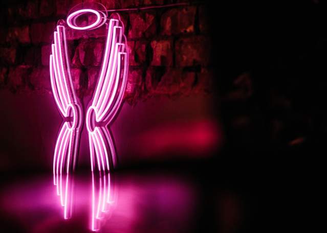 Angel And Two Bibles