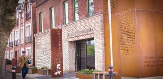 Man walking outside the James Connolly Visitor Centre.