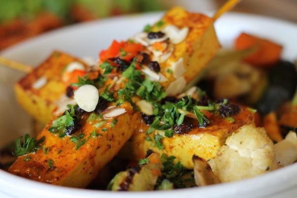 A bowl of vegetable skewers